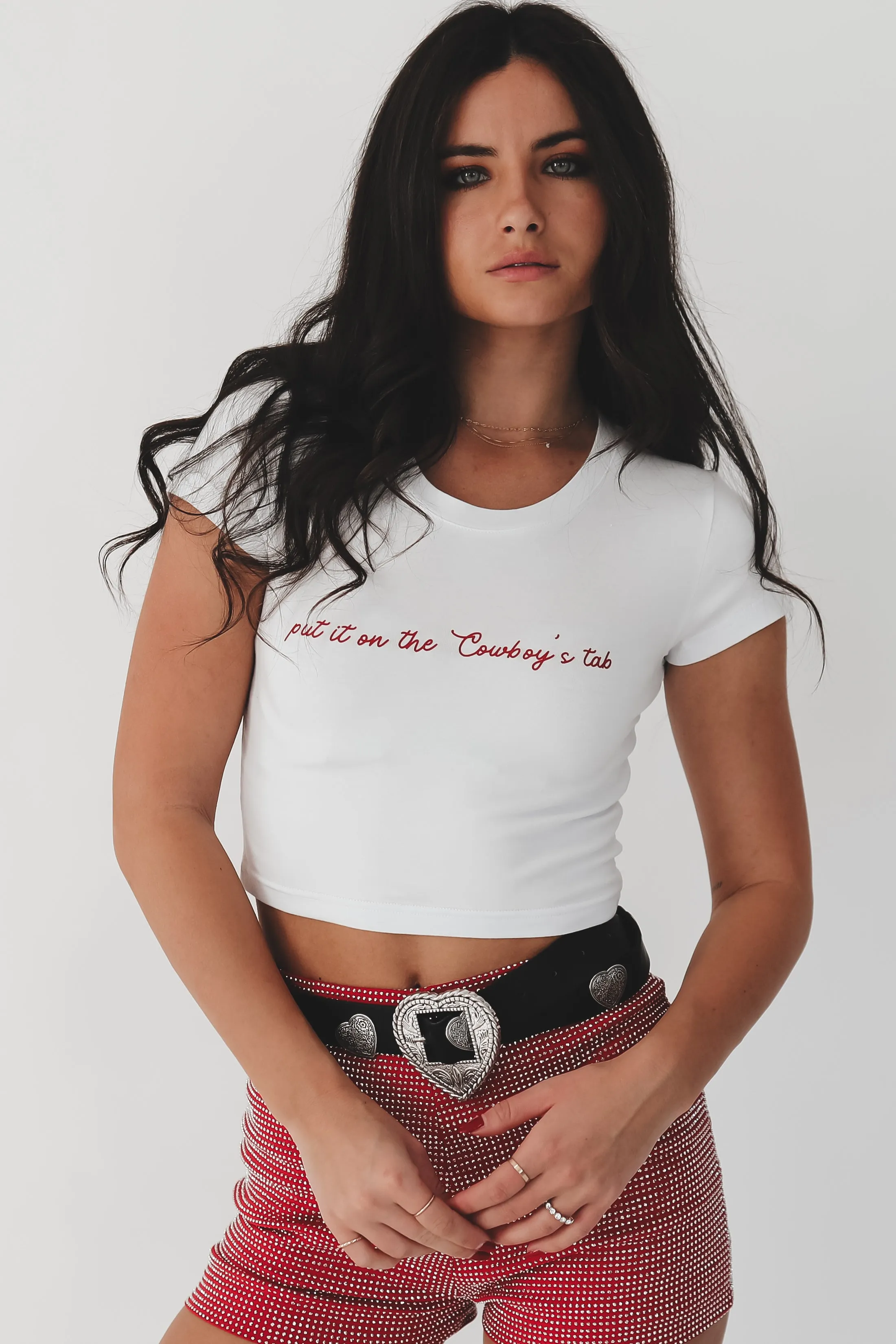 Put It On The Cowboys Tab Graphic Short Sleeve Babydoll Cropped Tee